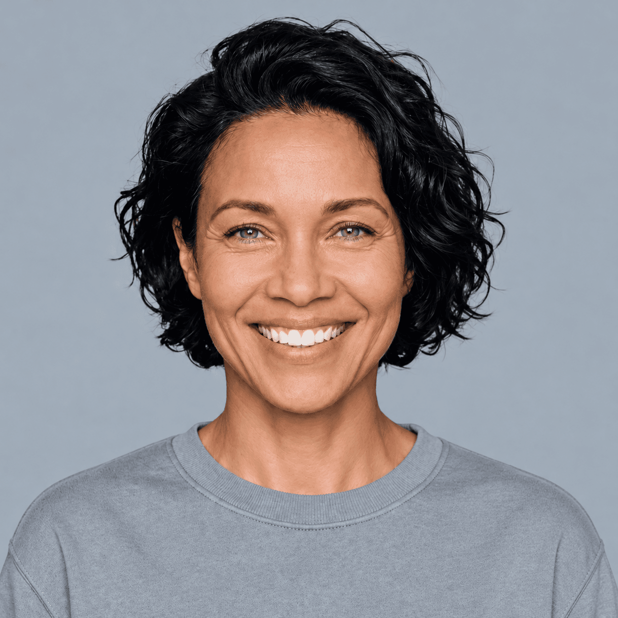 Woman in a gray sweater