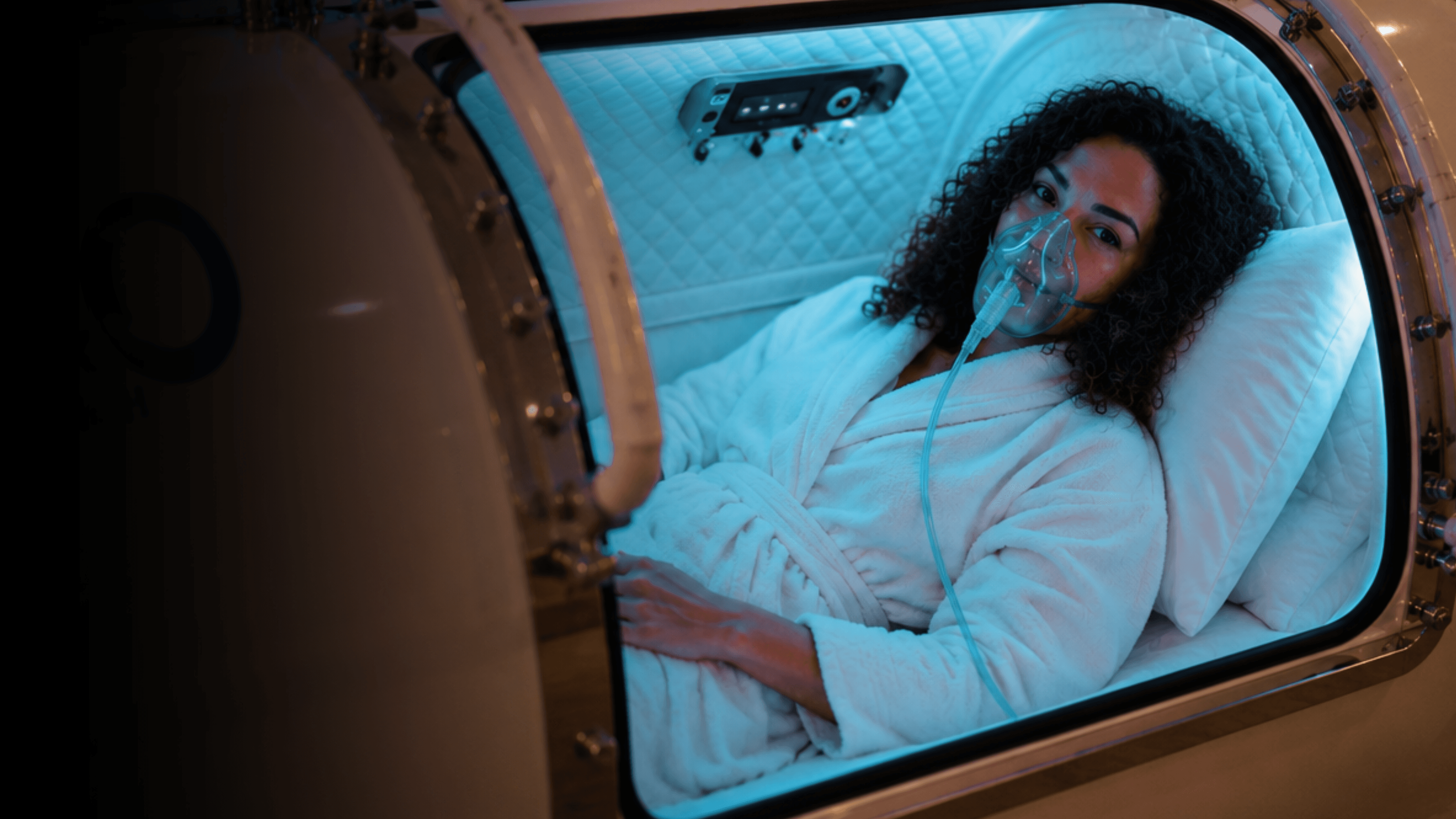 Woman inside the Hyperbaric Oxygen Chamber