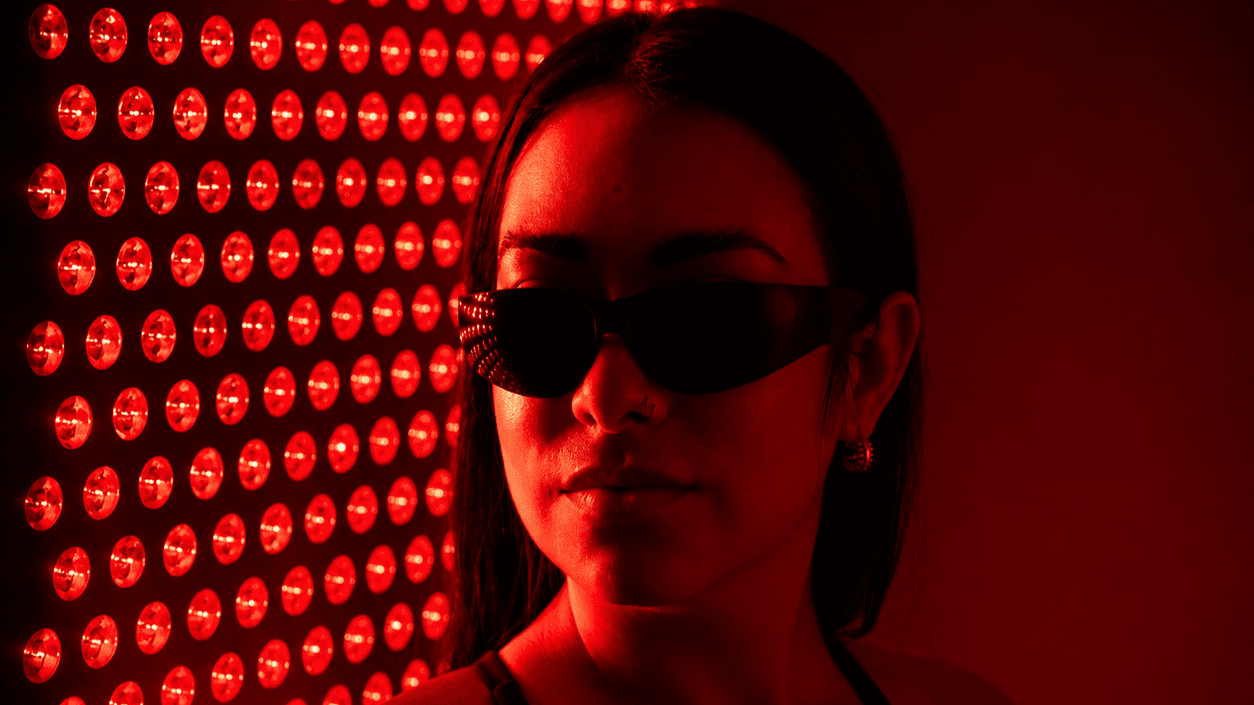 Woman receiving Red Light and PEMF Fusion